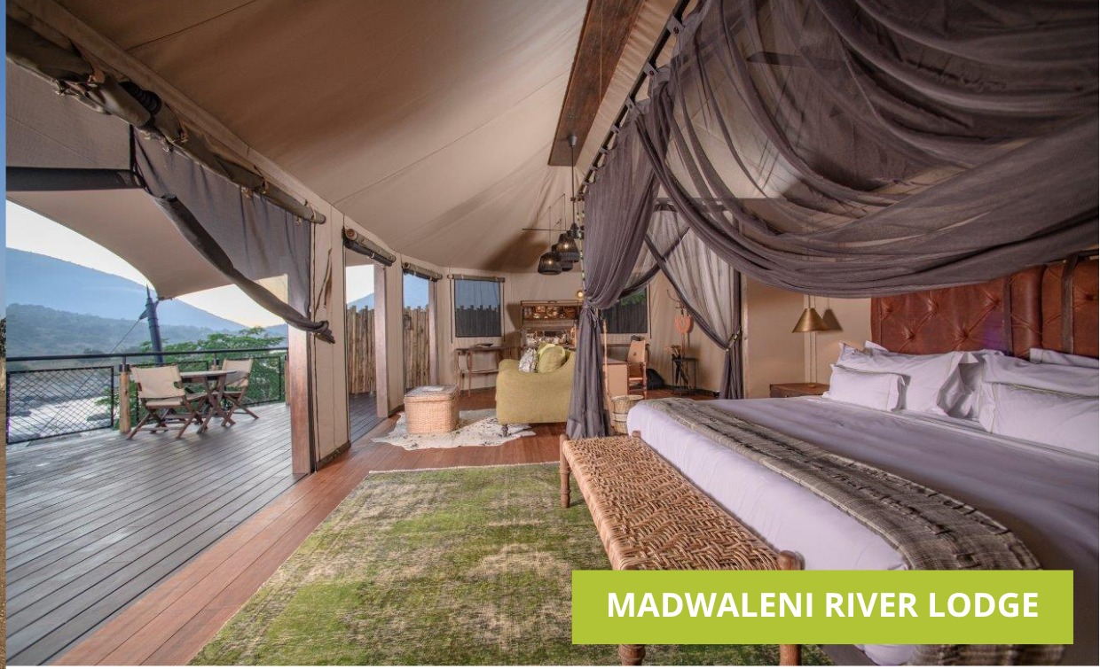 Guest tent interior with river-facing deck at Madwaleni River Lodge, Babanango Game Reserve