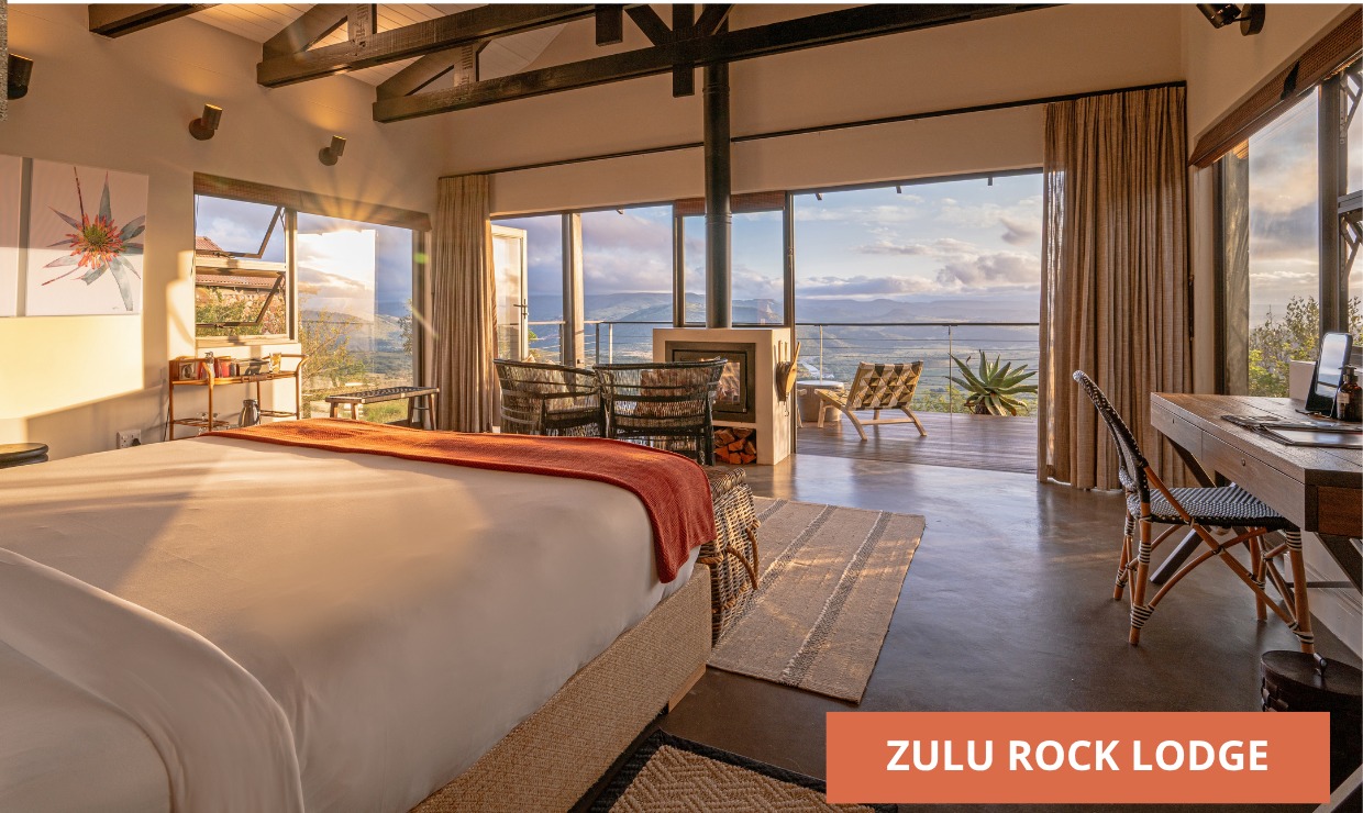 Bedroom with panoramic valley views at Zulu Rock Lodge, Babanango Game Reserve